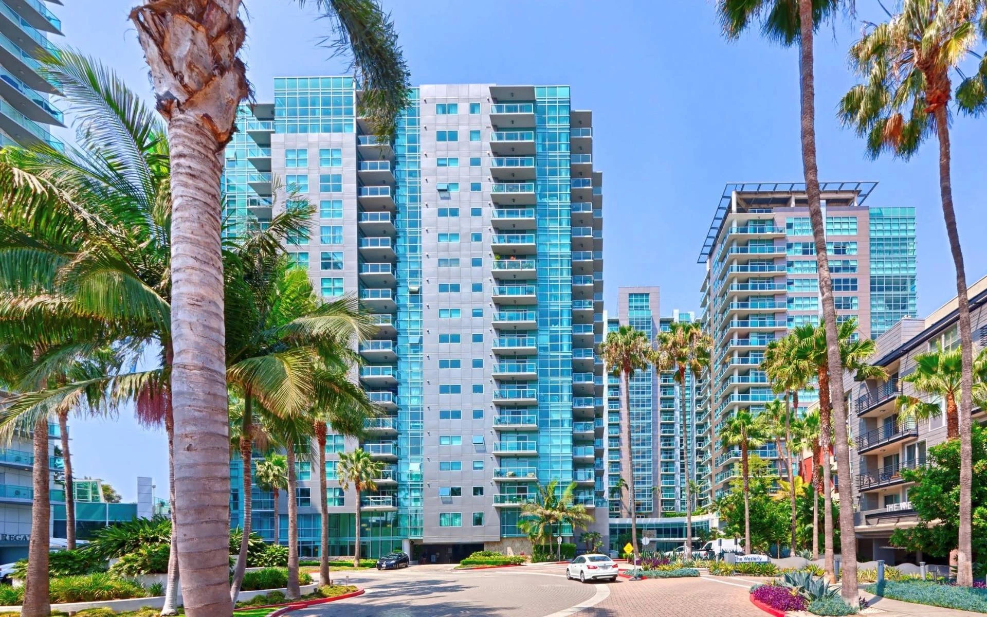 Azzurra tower framed by palm trees